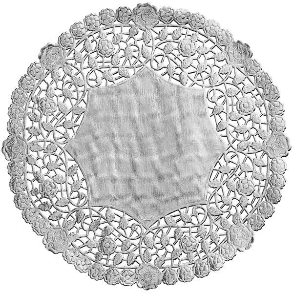 A white doily with a floral design.