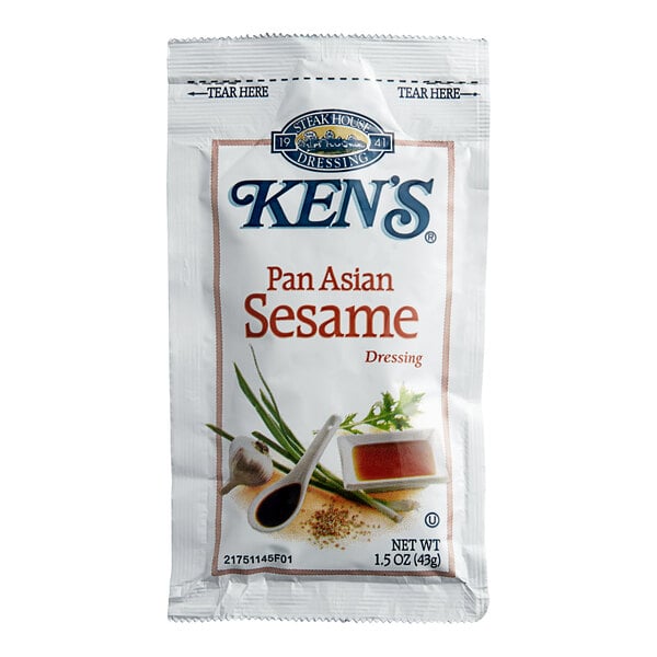 A Ken's Foods Pan Asian Sesame Dressing packet with a white background.