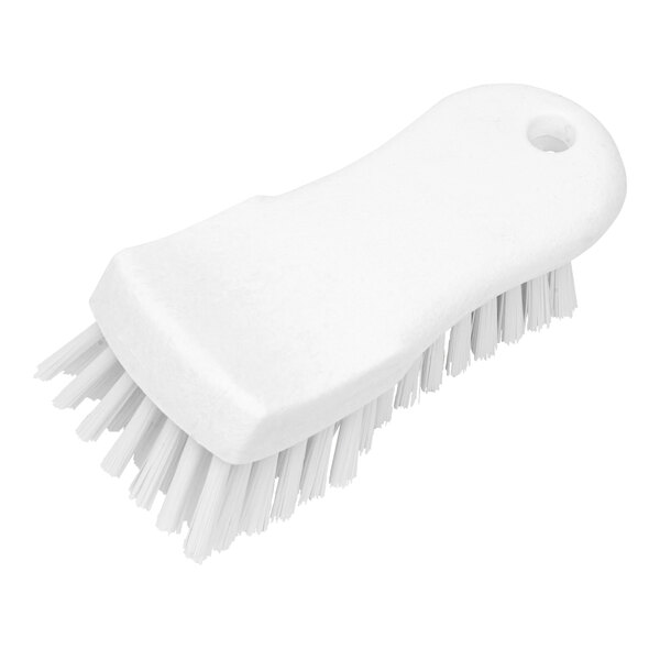 A Carlisle white handheld scrub brush with bristles.