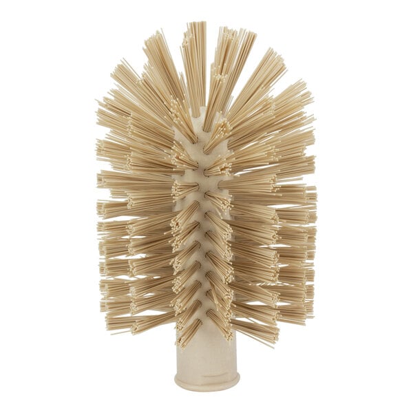 A round tan brush with many bristles.