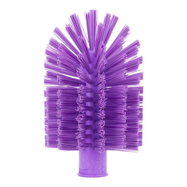 A close-up of a Carlisle Sparta purple pipe and valve brush with bristles.