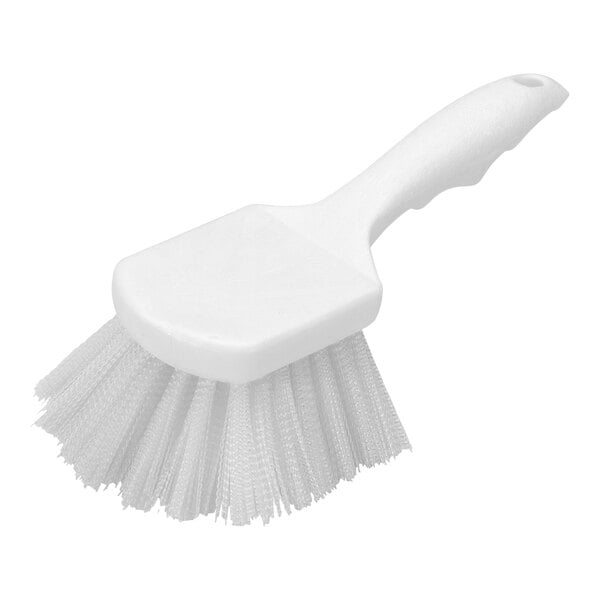 A Carlisle white pot scrub brush with a handle.