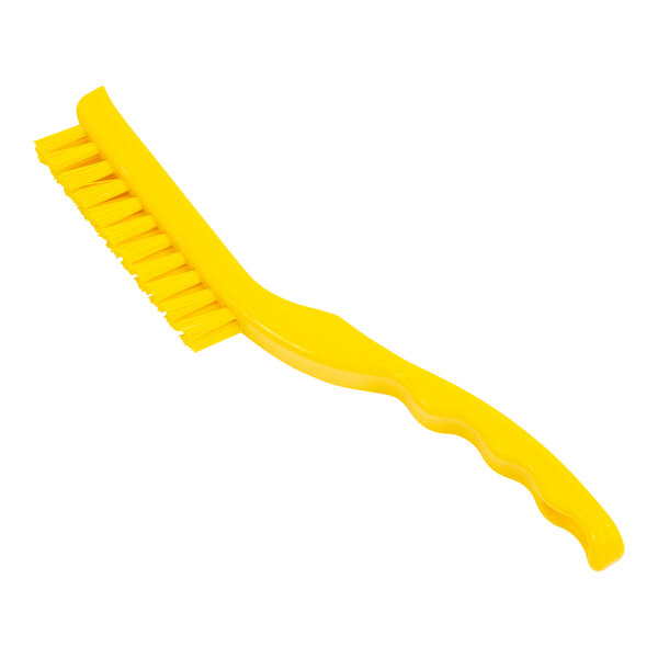 A close-up of a yellow Carlisle Sparta narrow detail brush with a handle.