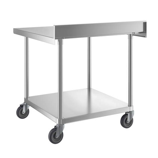 A Regency stainless steel work table with undershelf and casters.