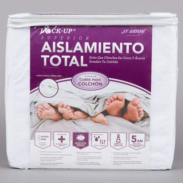 A white JT Eaton queen size mattress cover with a purple and white label with feet on it.