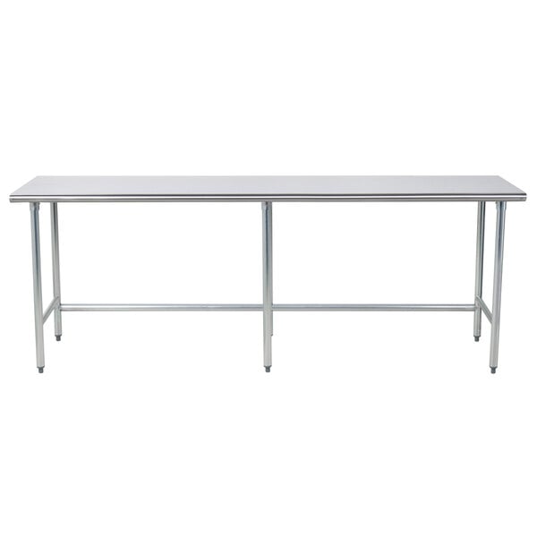 A long stainless steel Advance Tabco work table with metal legs.