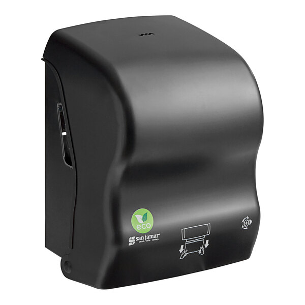 A black San Jamar Simplicity Essence EcoLogic mechanical hands free paper towel dispenser on a counter.