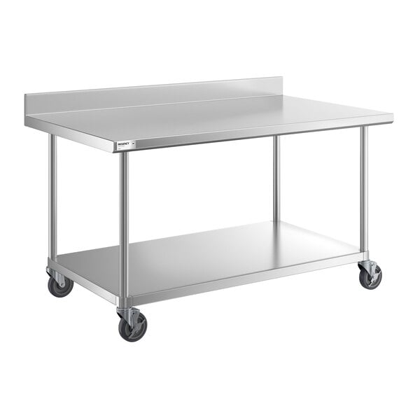 A stainless steel work table with a backsplash, undershelf, and four caster wheels.