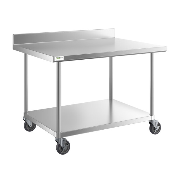 A Regency stainless steel work table with undershelf and casters.
