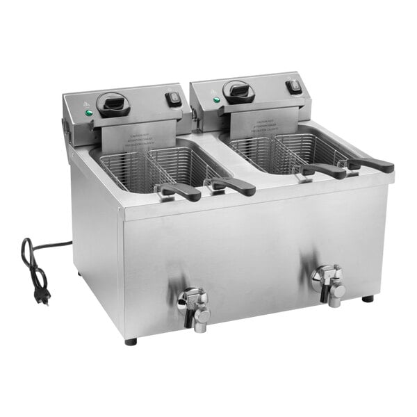 A Vollrath commercial countertop electric deep fryer with two wells and two baskets.