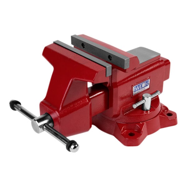 A red Wilton Utility cast iron bench vise with a swivel base.