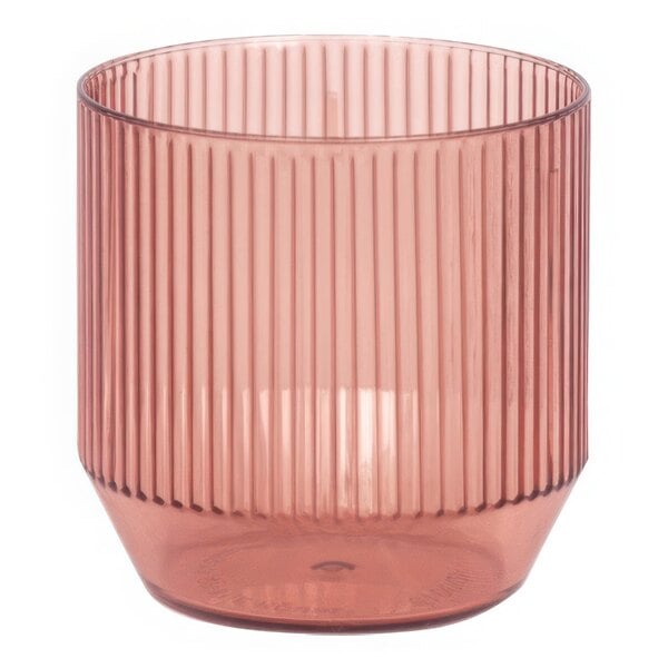 A pink Front of the House Gatsby plastic rocks glass with a striped design.