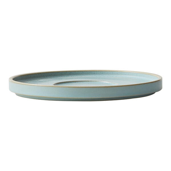 A frosted blue Oneida Moira stoneware saucer with a gold rim.