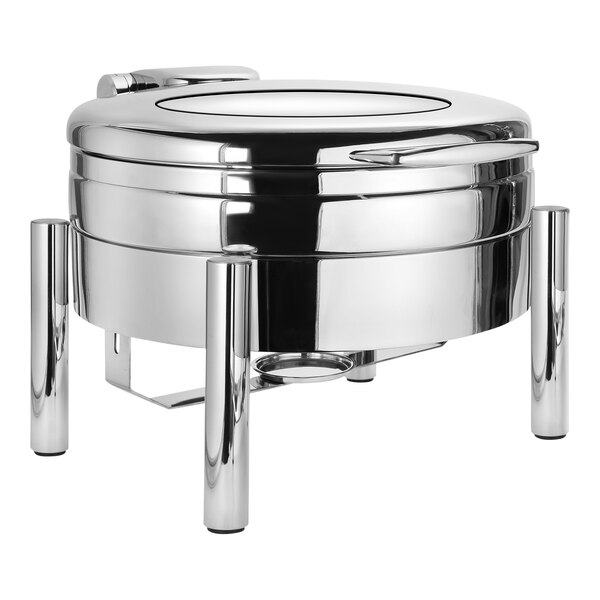 An Eastern Tabletop stainless steel round chafer with a glass lid on a stand.