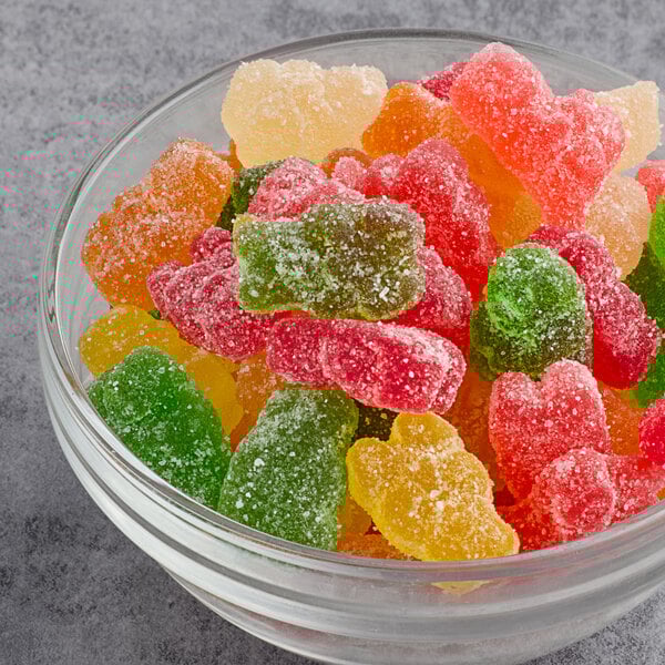 A bowl filled with colorful Albanese Sour Gummi Bears.