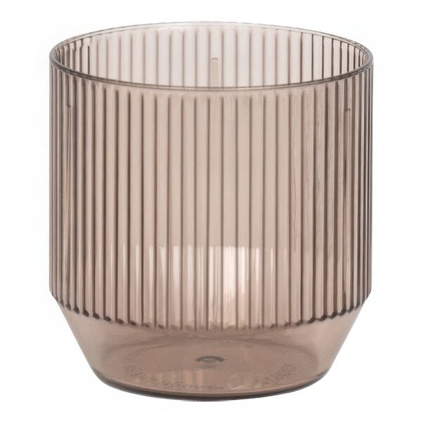 A brown plastic rocks glass with a ribbed surface.