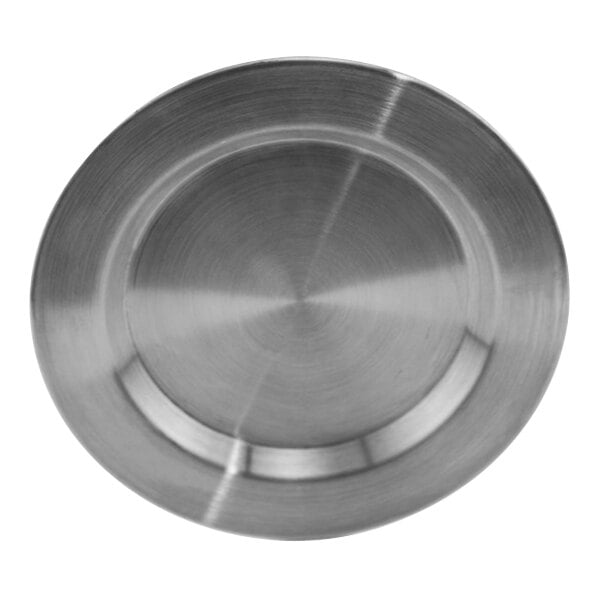 A close-up of a circular stainless steel wine coaster.