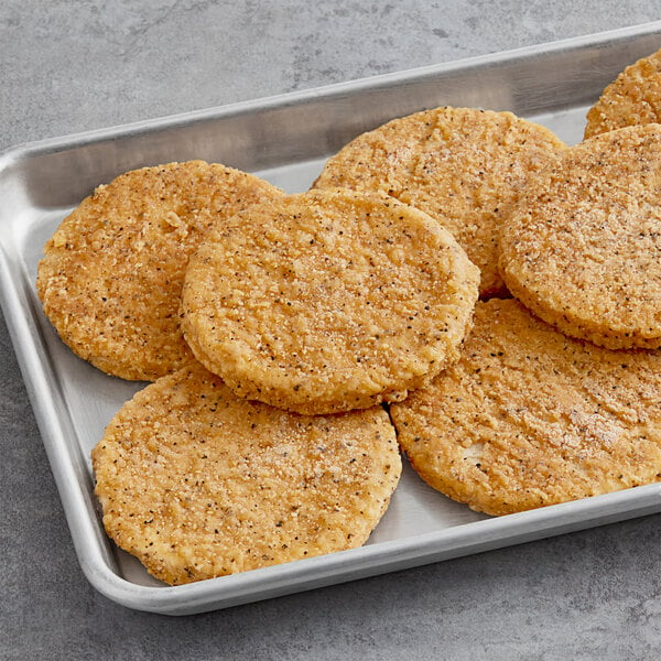 Daring Foods plant-based breaded chicken patties on a plate.