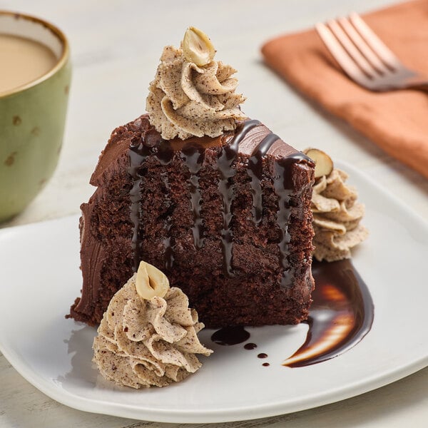 A piece of chocolate cake with Bare Unsalted Hazelnut Butter on a plate.