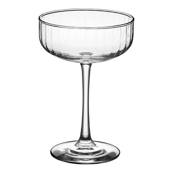 A clear Libbey coupe glass with a stem.