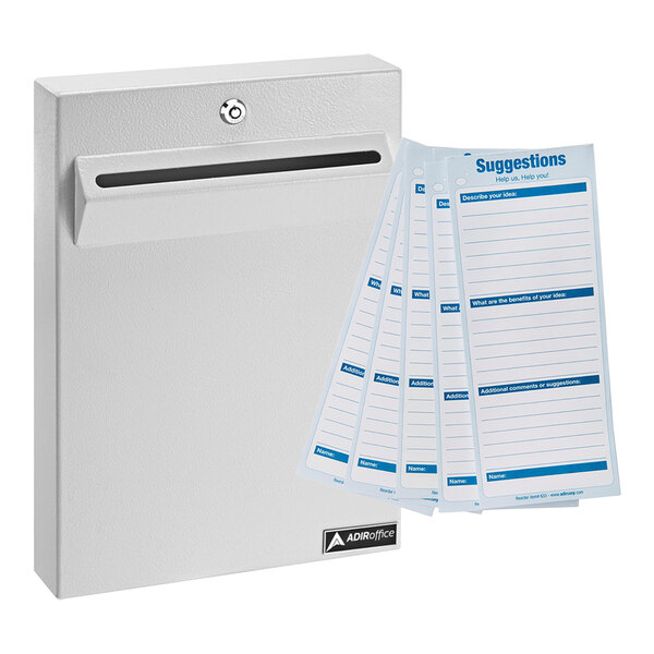 A white steel wall mounted drop box with suggestion cards in the slot.