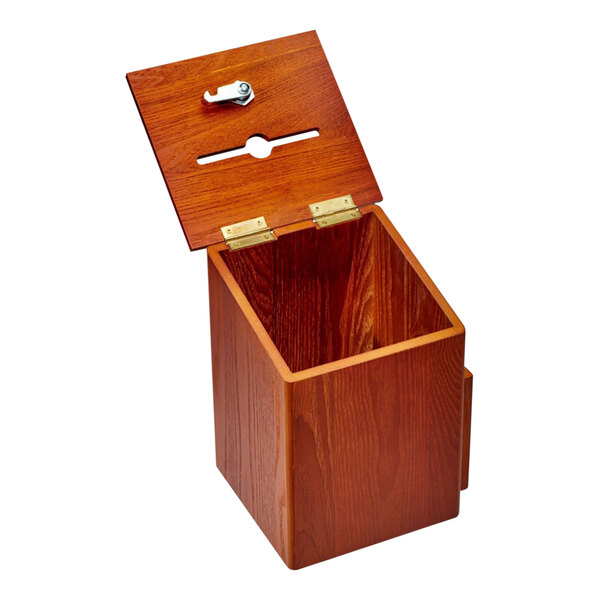 An oak wood wall mounted suggestion box with a metal lid open.
