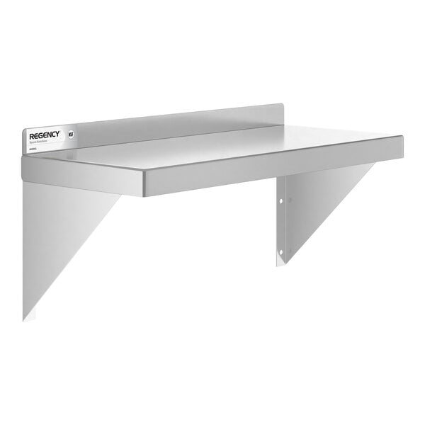 A metal wall-mounted shelf with two triangular support brackets and a raised back edge.