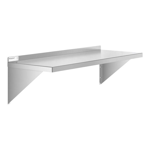 A stainless steel solid wall shelf with triangular supports and a backsplash.