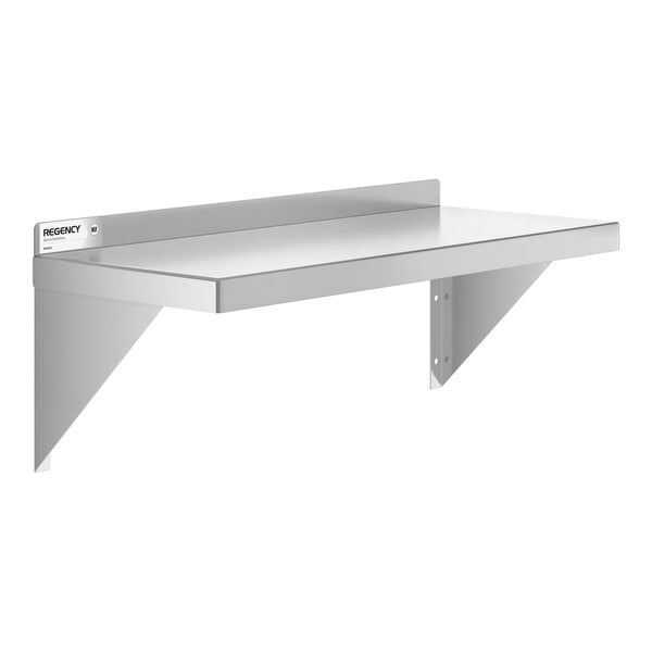 A metal wall-mounted shelf with two triangular support brackets and a raised back edge.