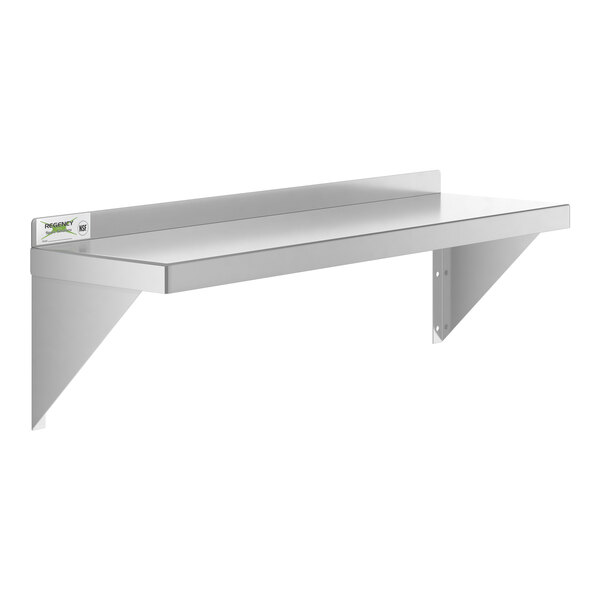 A Regency stainless steel wall shelf.