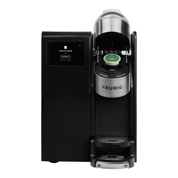 A black Keurig K-3500 commercial coffee maker with a silver and green lid.