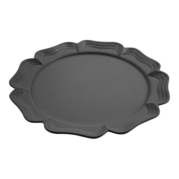 A black Bon Chef cast aluminum round platter with a scalloped edge.