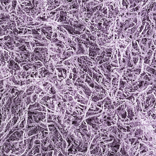 A close-up of a pile of Spring-Fill Orchid Crinkle Cut Paper Shred.