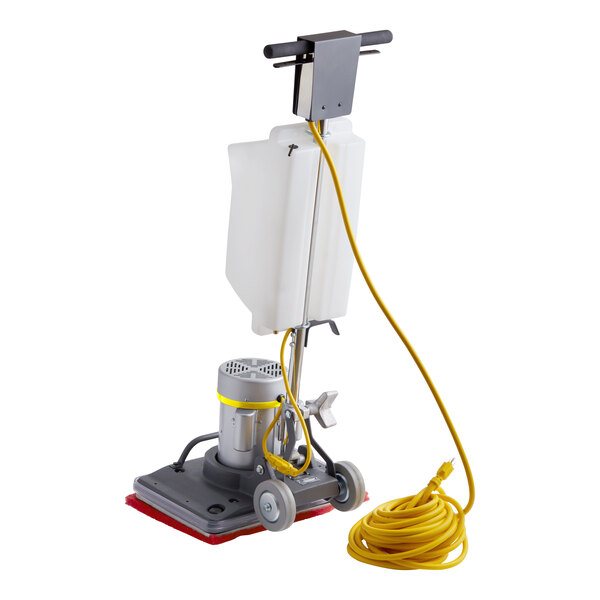 A white rectangular floor machine with a yellow cord.