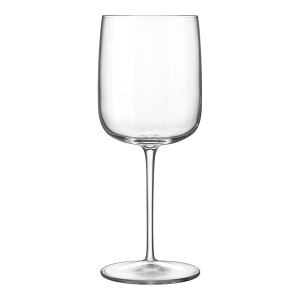 A close-up of a Luigi Bormioli Vinalia clear wine glass with a long stem.