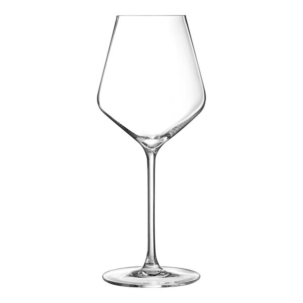 A close-up of a clear Chef & Sommelier wine glass with a long stem.