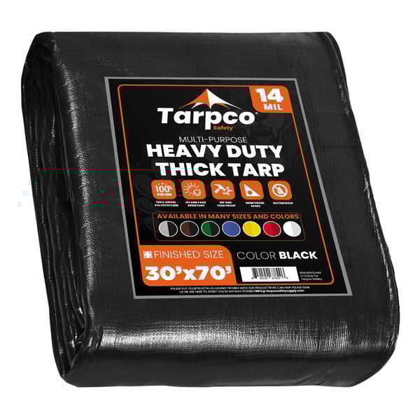 A black Tarpco heavy-duty poly tarp with white text and orange and black reinforced edges.