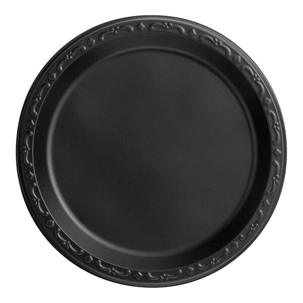 A close-up of a black Ecopax polypropylene plate with a decorative border.