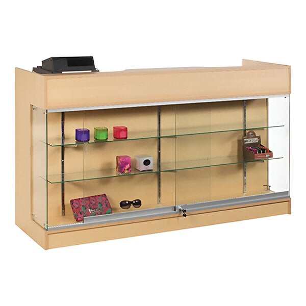 A maple cash register counter with a locking glass showcase and display shelves.
