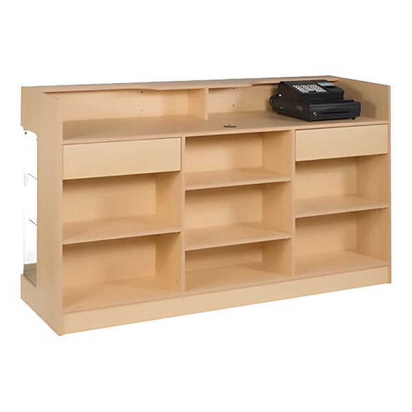 A maple cash register counter with multiple shelves, two drawers, a locking showcase, and a cash register on top.