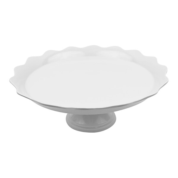 A white Dalebrook melamine round pedestal cake stand with a scalloped edge.