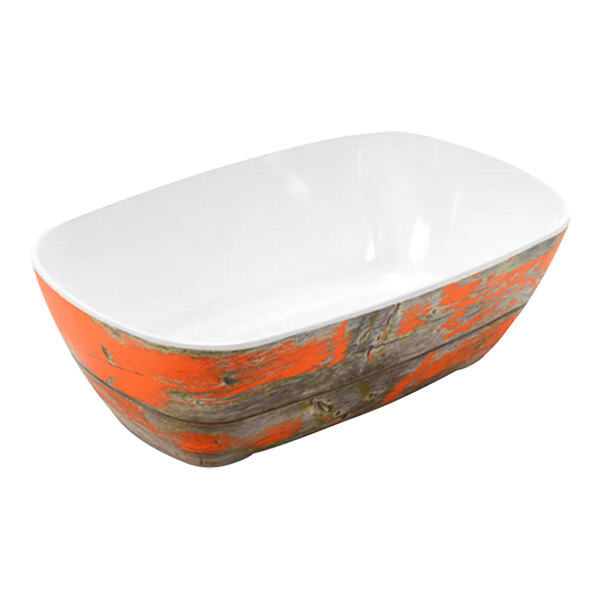 A Dalebrook Tura melamine crock in rustic orange and white.