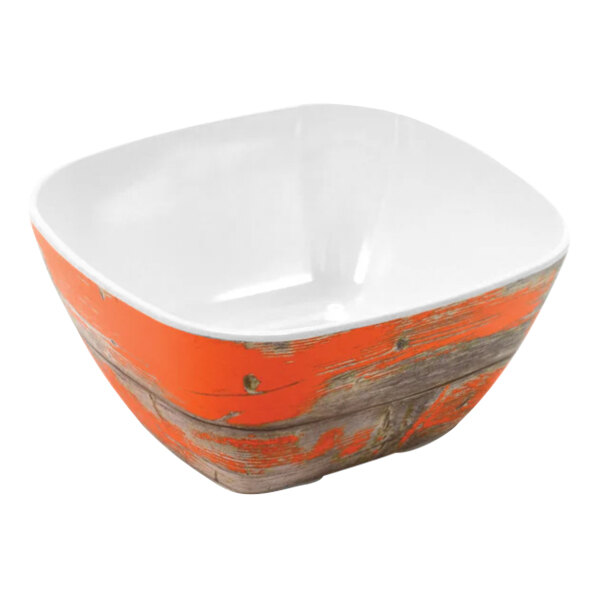 A Dalebrook Tura 1/6 size melamine crock with a rustic orange paint.