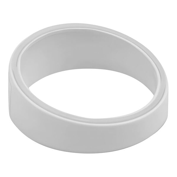 A white slanted display riser with a thin white band and a small white circle at the top.