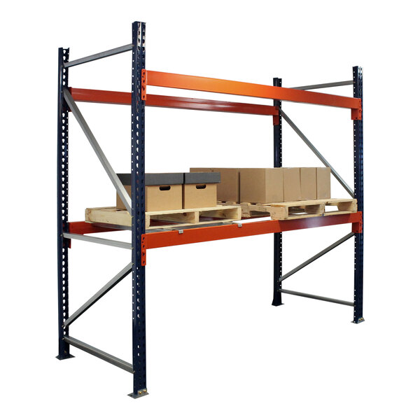 A blue and orange Interlake Mecalux heavy-duty metal pallet rack with boxes on it.