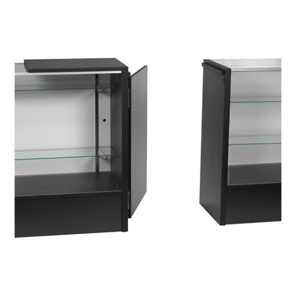 A black cabinet with glass shelves and a swing open door.