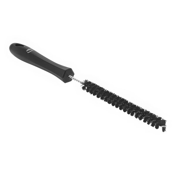 A black brush with a black handle.