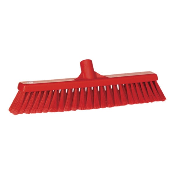 A red brush with soft / split bristles.