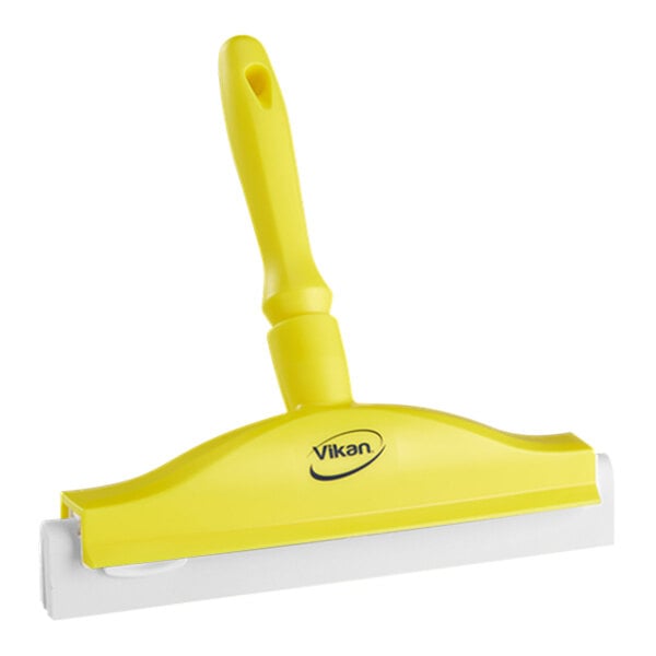 A yellow Vikan rubber hand squeegee with a plastic frame and handle.