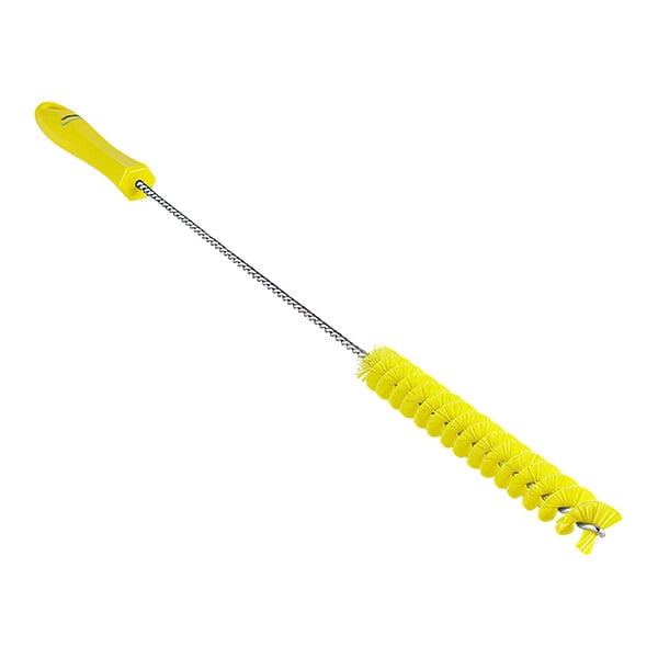 A yellow plastic tube brush with a long handle.